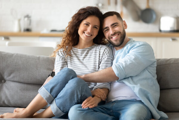 couple sitting on the couch in the living room